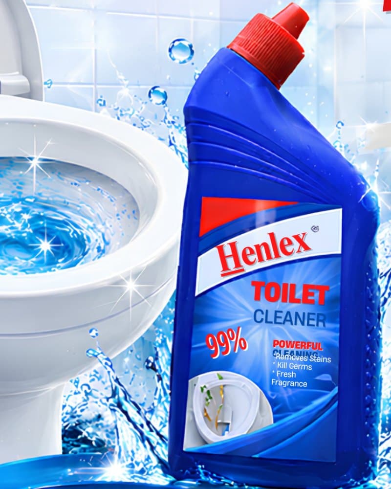 Henlex Toilet Cleaner bottle with water splash beside a clean toilet bowl