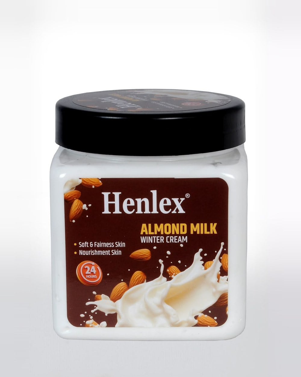 Henlex Almond Milk Winter Cream in a white jar with black lid and brown almond label